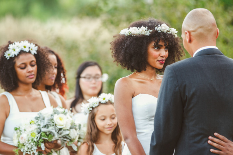 21 flower wedding hairstyles: crowns, updos, and more!