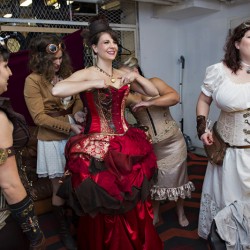 Simmons Sharp Photomuse SHA1502320474 low - The red dress at this theatrical steampunk wedding is LIFE theatrical steampunk wedding as seen on @offbeatbride #steampunk #weddings