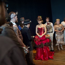 Simmons Sharp Photomuse SHA1502320749 low - The red dress at this theatrical steampunk wedding is LIFE Steampunk wedding as seen on @offbeatbride #steampunk #weddings
