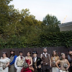 Simmons Sharp Photomuse SHA1502321098 low - The red dress at this theatrical steampunk wedding is LIFE Steampunk wedding as seen on @offbeatbride #steampunk #weddings
