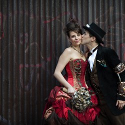 Simmons Sharp Photomuse SHA1502321425 low - The red dress at this theatrical steampunk wedding is LIFE Steampunk wedding as seen on @offbeatbride #steampunk #weddings