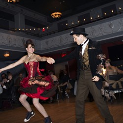 Simmons Sharp Photomuse SHA1502321689 low - The red dress at this theatrical steampunk wedding is LIFE Steampunk wedding as seen on @offbeatbride #steampunk #weddings
