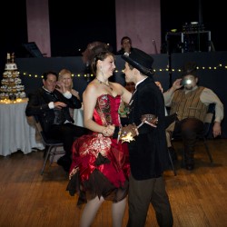 Simmons Sharp Photomuse SHA1502321718 low - The red dress at this theatrical steampunk wedding is LIFE Steampunk wedding as seen on @offbeatbride #steampunk #weddings