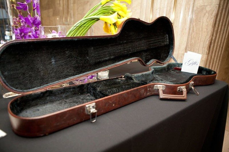 Don’t have a vintage suitcase? Use a guitar case card box