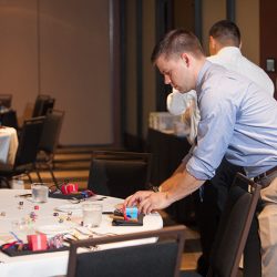 27 Reception Venue Staff Cameron Setting up Tables - Level up at this arcade adventure quest wedding Level up at this board games, arcade, adventure quest wedding as seen on @offbeatbride