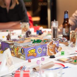 41 Reception King of Tokyo being played - Level up at this arcade adventure quest wedding Level up at this board games, arcade, quest wedding as seen on @offbeatbride