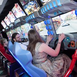 46 Reception Rebecca and Greg Playing Arcade Games - Level up at this arcade adventure quest wedding Level up at this board games, arcade, quest wedding as seen on @offbeatbride