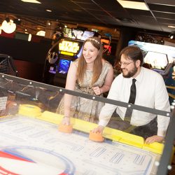 49 Reception Rebecca and Greg Playing Arcade Games - Level up at this arcade adventure quest wedding Level up at this board games, arcade, quest wedding as seen on @offbeatbride