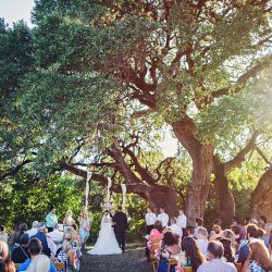 Scott Peabody Christina Carroll Photography favKimandJeremy0496 low - Hanging chandeliers and cowboy boots at this Texas rock 'n' roll wedding Hanging chandelier wedding decor as seen on @offbeatbride