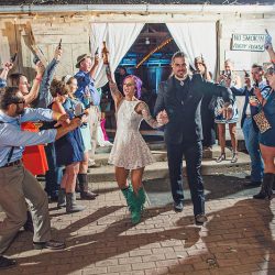 Scott Peabody Christina Carroll Photography favKimandJeremy1551 low - Hanging chandeliers and cowboy boots at this Texas rock 'n' roll wedding Chandeliers and cowboy boots at this Texas rock 'n' roll wedding