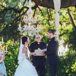 Scott Peabody Christina Carroll Photography favKimandJeremy2665copy low - Hanging chandeliers and cowboy boots at this Texas rock 'n' roll wedding Hanging chandelier wedding decor as seen on @offbeatbride