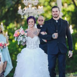 Scott Peabody Christina Carroll Photography favKimandJeremy2737 low - Hanging chandeliers and cowboy boots at this Texas rock 'n' roll wedding Hanging chandelier wedding decor as seen on @offbeatbride