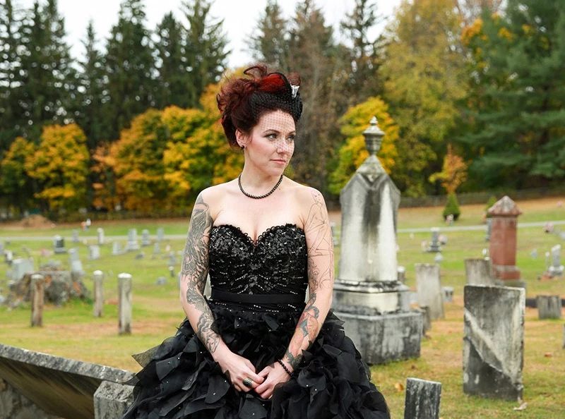 Get in a spooky mood with this haunted library meets Edgar Allan Poe wedding