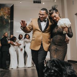 An art gallery wedding with the black wedding gown of our dreams