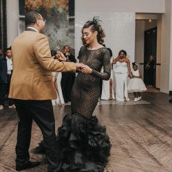 An art gallery wedding with the black wedding gown of our dreams
