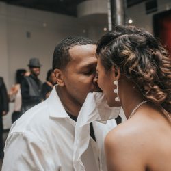 An art gallery wedding with the black wedding gown of our dreams