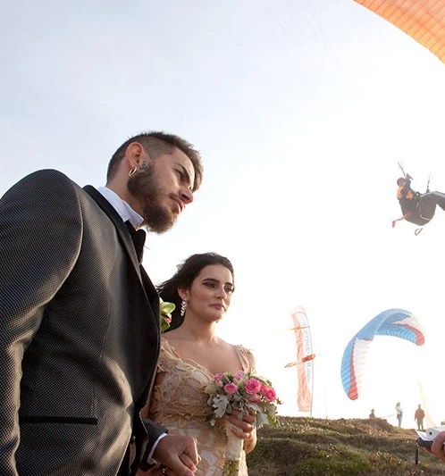 A parachuting ceremony exit at this wedding on a cliff in Portugal!