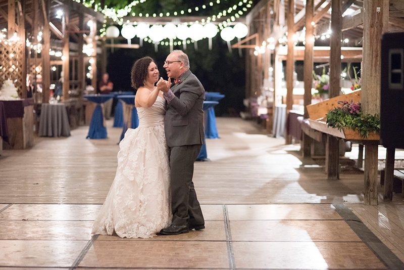 Lakeside love at sunset at this Ithaca farmers market wedding