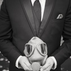 A gas mask-erade wedding fit for the impending zombie apocalypse
