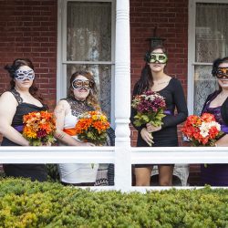 A gas mask-erade wedding fit for the impending zombie apocalypse