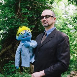A Muppet officiated this cliffside New York wedding with a killer black dress