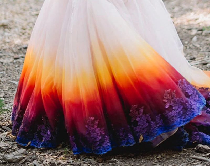 When a hand-airbrushed wedding dress at a colorful forest wedding slayed us forever…