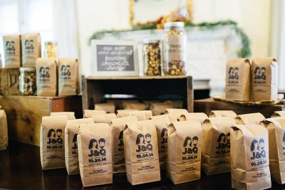 These personalized popcorn favors can be food, favors, AND table numbers