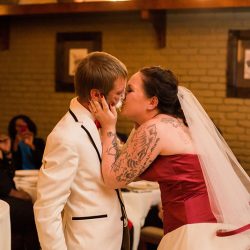 woodwedding cakecutting 40 32119037062 o 1 - This laid-back wedding had bridesmaids in white and a BEETLEJUICE officiant This laid-back wedding had a wedding party in white and BEETLEJUICE