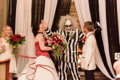 This laid-back wedding had a wedding party in white and BEETLEJUICE