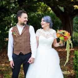 Offbeat Bride 3635 - A blue-haired bride and bearded bassist let us bask in their darkly elegant wedding A blue-haired bride and bearded bassist let us bask in their goth wedding