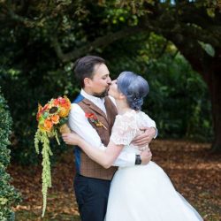 Offbeat Bride 3636 - A blue-haired bride and bearded bassist let us bask in their darkly elegant wedding A blue-haired bride and bearded bassist let us bask in their goth wedding