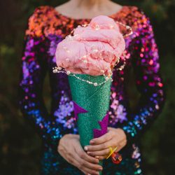 Cotton candy, smoke bombs, and LED outfits shine at this wonderfully weird Austin wedding
