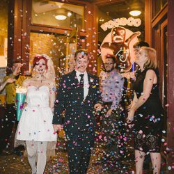 Cotton candy, smoke bombs, and LED outfits shine at this wonderfully weird Austin wedding