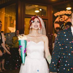 Cotton candy, smoke bombs, and LED outfits shine at this wonderfully weird Austin wedding