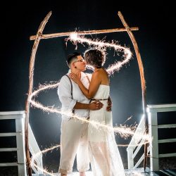 erica and stef wedding 732sparkler 32780385561 o - Love wins at this stunning beach wedding (despite tons of rain!) Love wins at this beach wedding (despite tons of rain!)