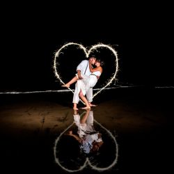 erica and stef wedding 733sparkler 32863684696 o - Love wins at this stunning beach wedding (despite tons of rain!) Love wins at this beach wedding (despite tons of rain!)