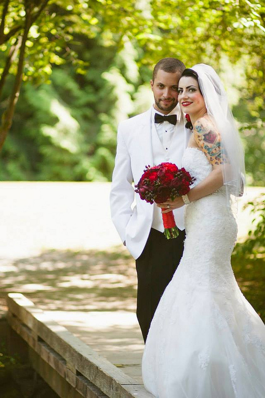 Nevada & Trevor’s Alice in Wonderland glamorous garden wedding