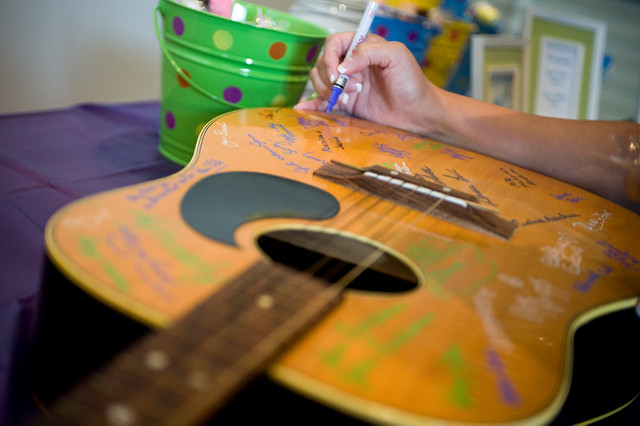 Rock star guestbook alternative: Sign a guitar!