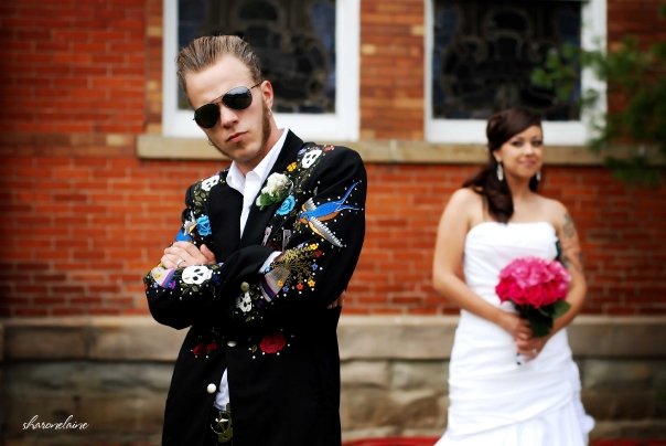 Smoking hot groom in a Manuel jacket