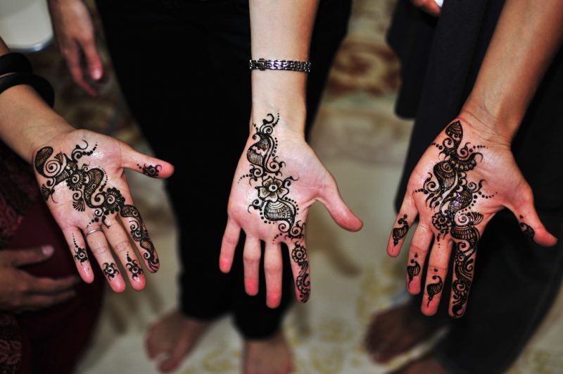 Why do couples borrow cultural elements for their wedding, and how can you do so respectfully?