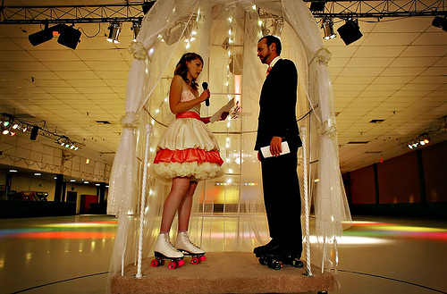 Check the ruffled short wedding dress at this rollerskating wedding