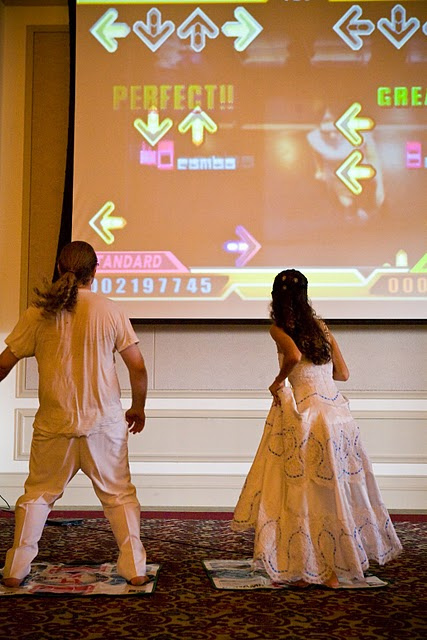 Use a projection screen or a big wall for a video game reception