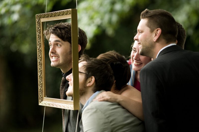 Rig up an easy outside photo booth by hanging a frame from a tree
