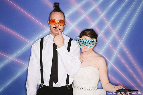 Dina & Travis’ Bruce Campbell-loving ’90s mohawked wedding