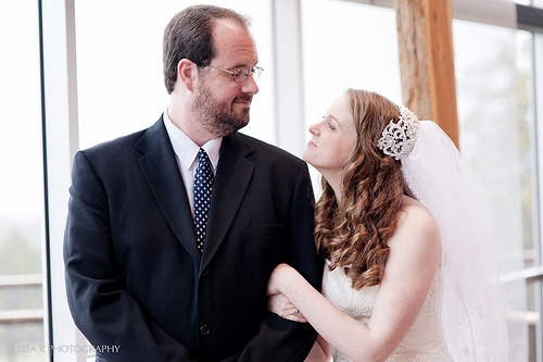 Emily & Bill’s rainy and cozy camp chapel wedding