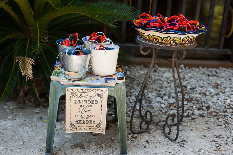 Give your guests sunglasses during your ceremony in the sun