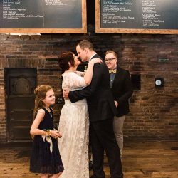 Dunne Hogue LindsayKingPhotography 20170401NicoleKenWedding0901 low - An April Fool's Day surprise pizza parlor wedding Ceremony kiss - An April Fool's Day surprise pizza parlor wedding