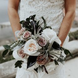 Pine cones, flowery hair, and forest chic combine at this rustic mountain wedding