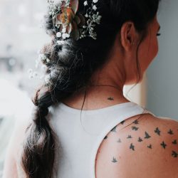 Pine cones, flowery hair, and forest chic combine at this rustic wedding