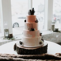 Pine cones, flowery hair, and forest chic combine at this rustic chic wedding